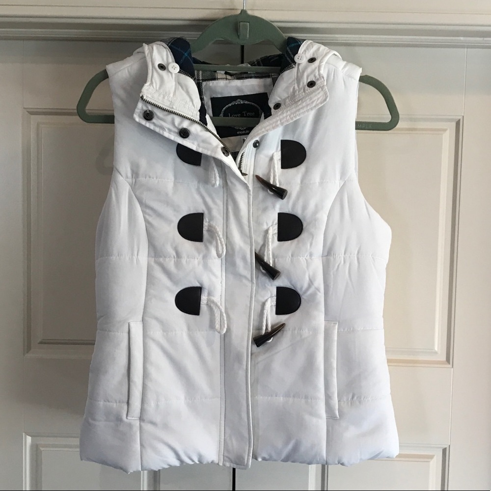 White puffer vest.